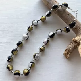 Necklace with black pastel, silver and gold Murano glass sphere beads on silver